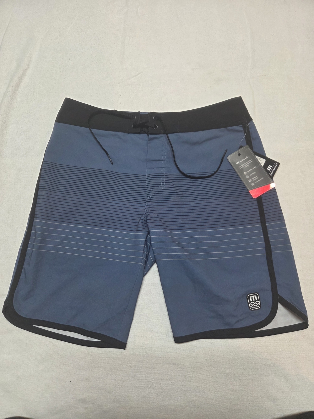 Travis Mathew Blue Striped Swim Board Shorts with Black Trim
